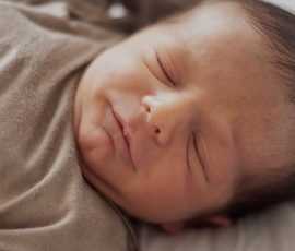 portrait new born sleeping